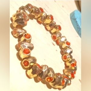 Orange Rhinestones Encased In Gold Bead Bracelet